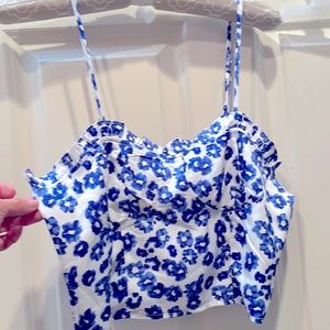 Shein crop top flowers. new but tags removed.Zipper closure & adjustable strap